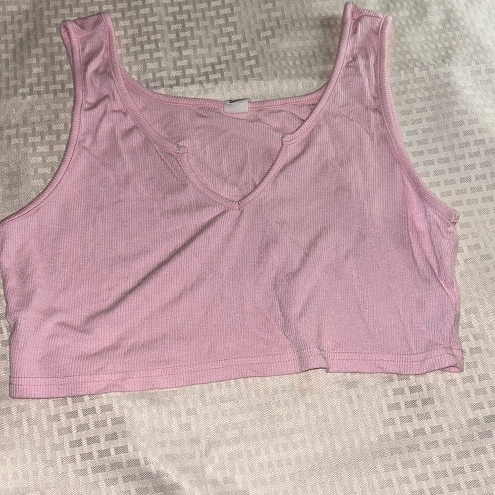 Woman’s pink cropped tank top size Medium
